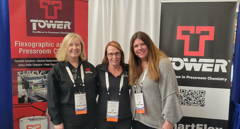 Ann Rider (L), Christine Schwab, and Kristin Olson-Kott detail Tower Products' newest cleaning solutions for the modern pressroom.